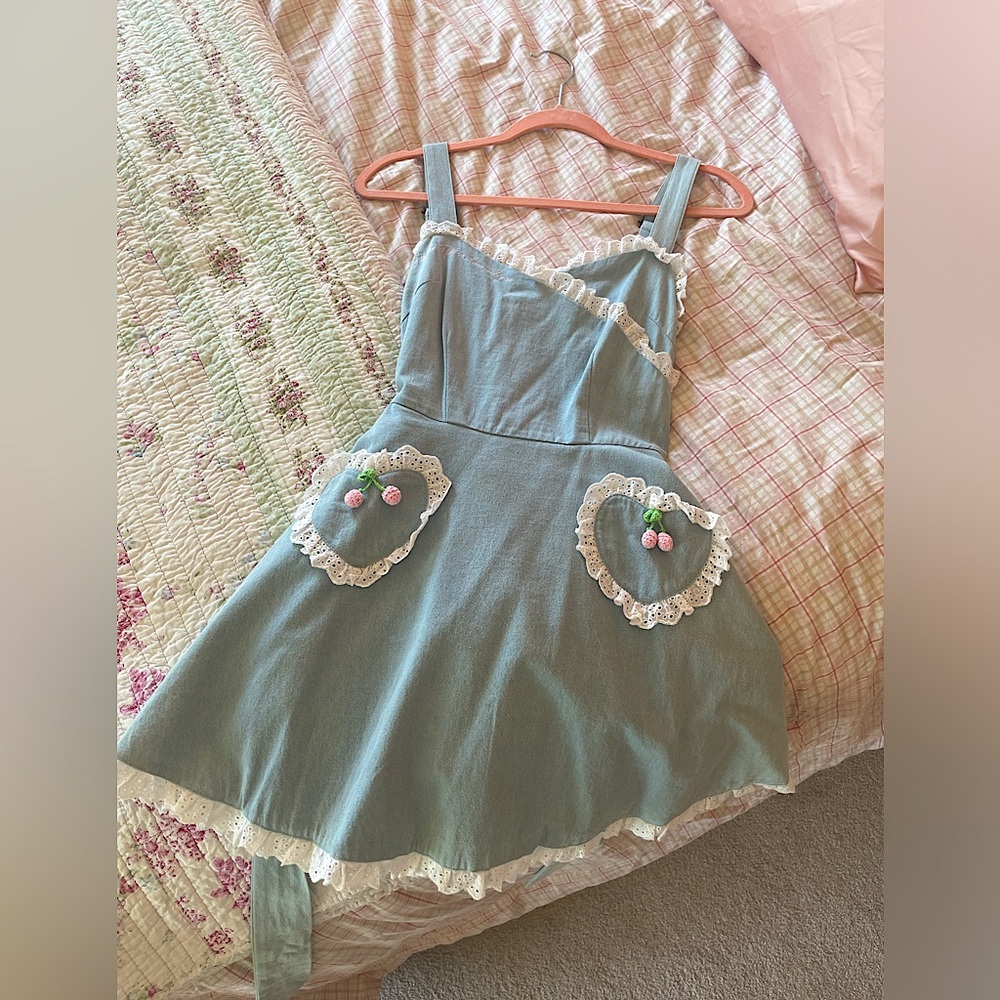 Authentic Swankiss dress. Size small women’s. Embroidered dress with cherries